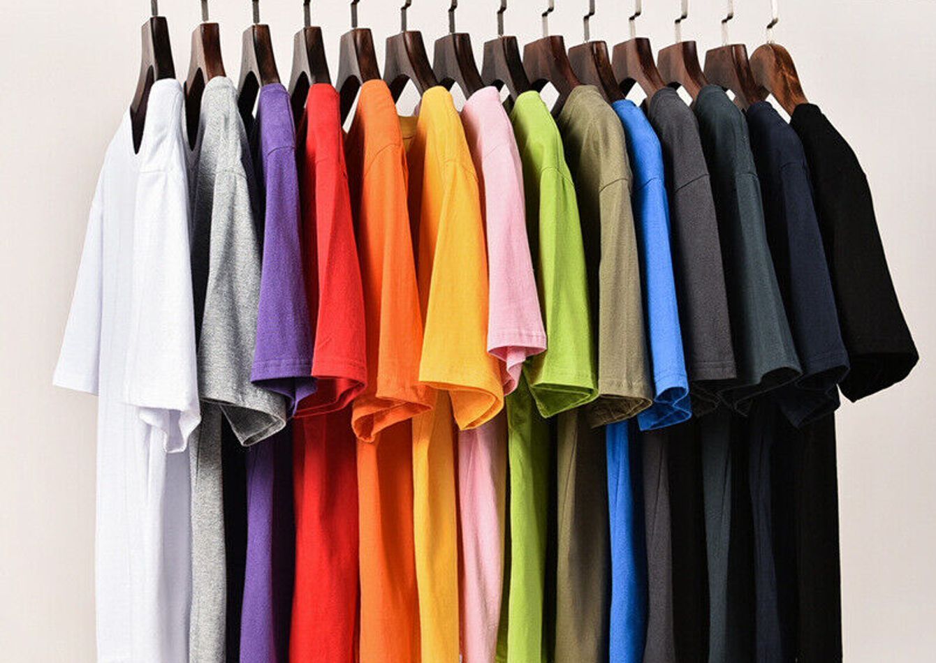 (ETi8KGlDtMJXdPsZoIlOo)large-tee-shirt-rack-photo.jpg.jpg
