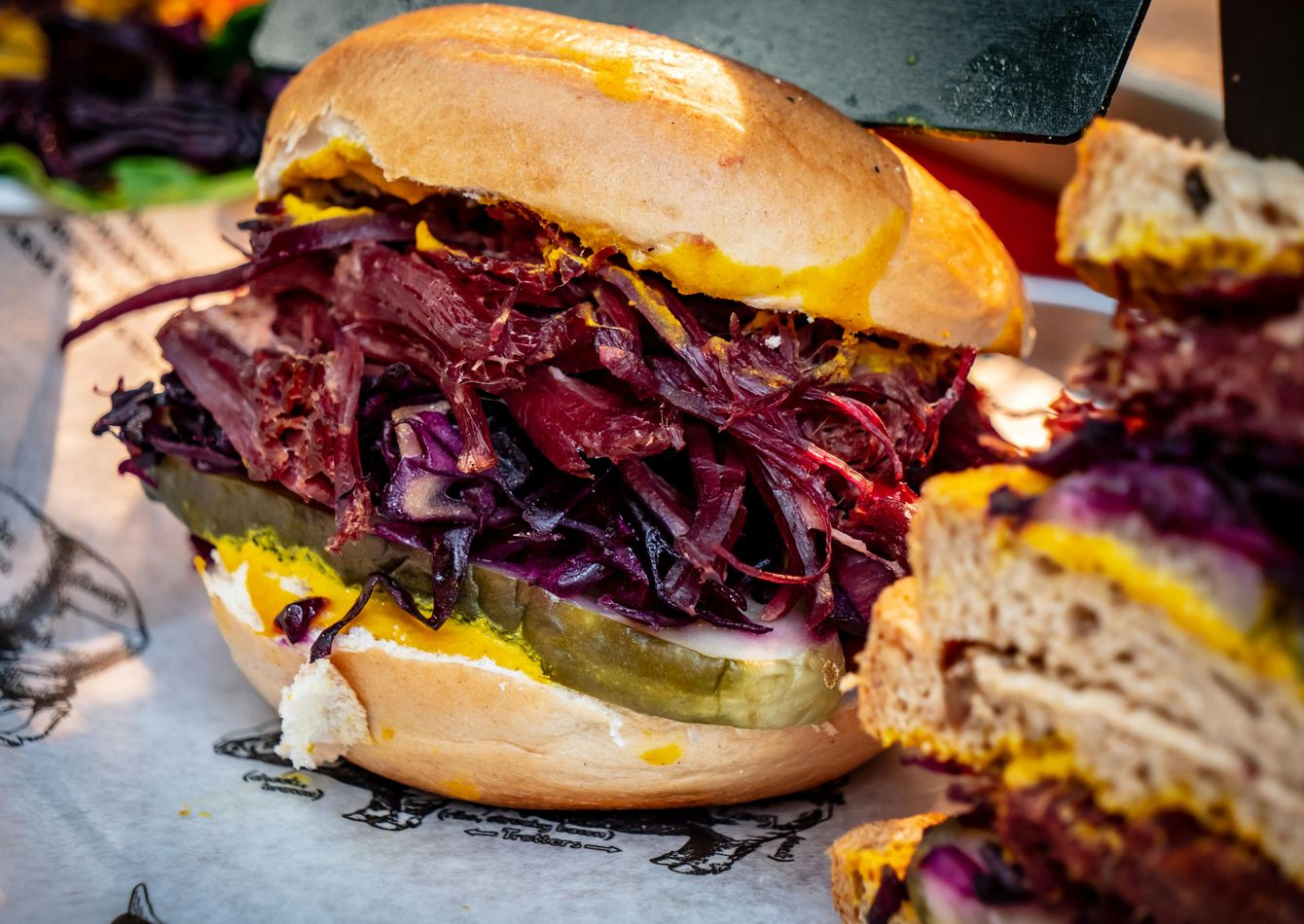 Image of Iconic Community Market & Deli includes Real Estate